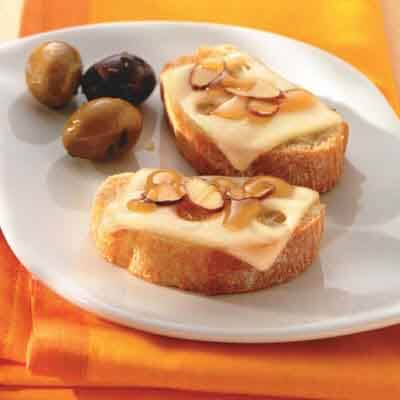 Honey & Almond Swiss-Topped Crostini