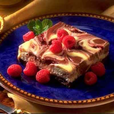 Double Chocolate Raspberry Swirl Cheesecake Bars Recipe | Land O’Lakes